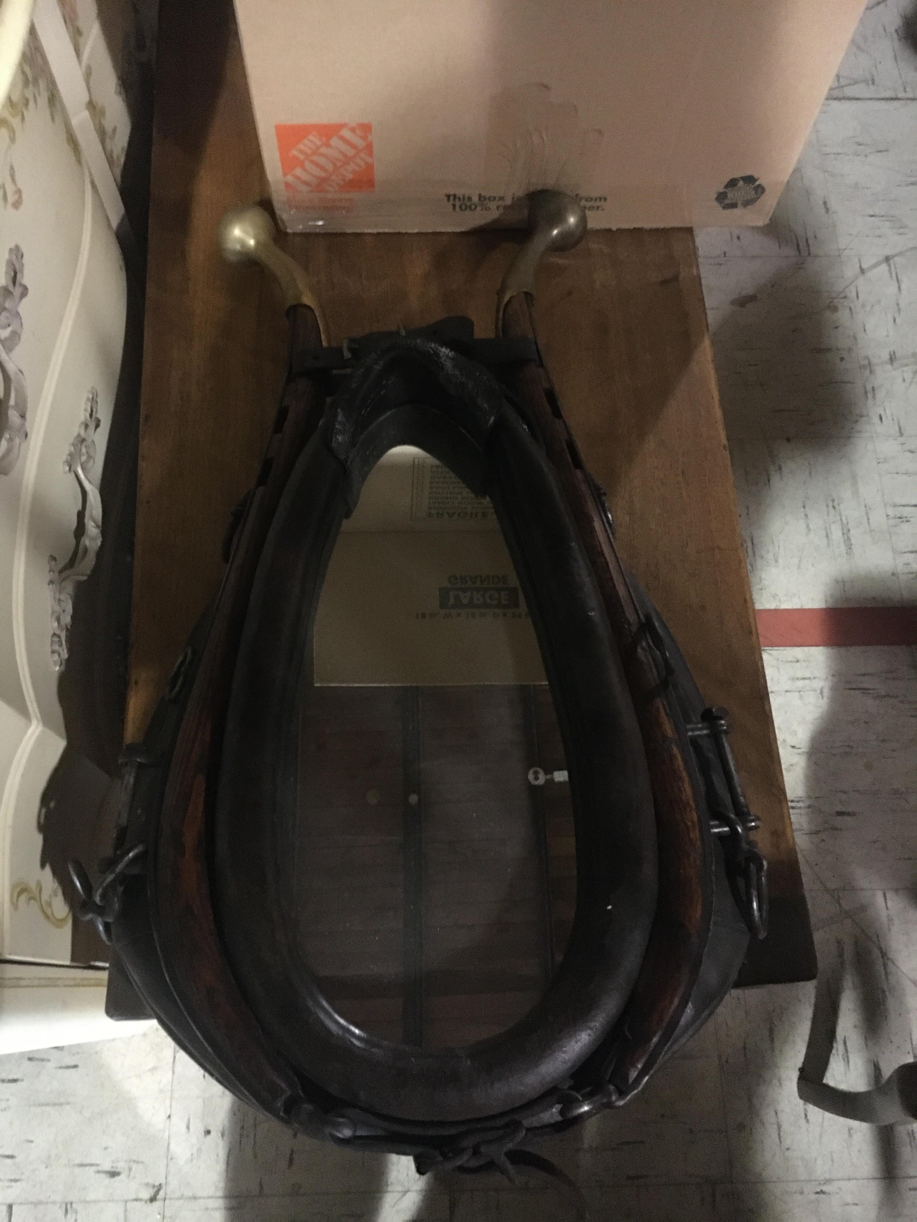 Handsome Horse Collar Mirror, Great Details, Very Good Condition. The shaped mirror plate set within the black leather collar, the two hames ending in brass caps.  Priced for mirror collar only.
Height 30 inches.