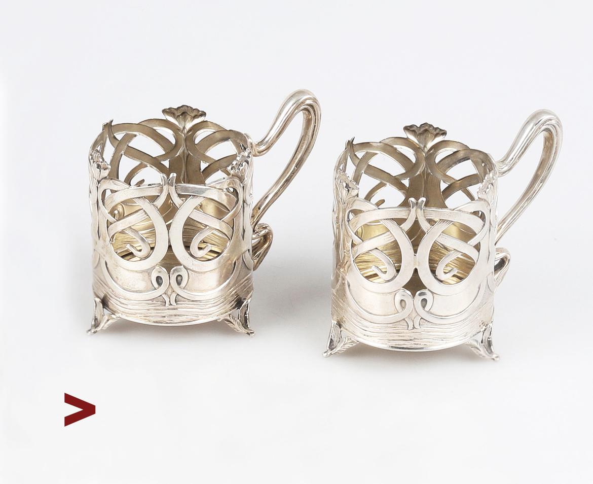A pair of wonderful Art Nouveau-styled Russian 84 Silver Tea Glass Holders made in Moscow at the workshop of a very famous and one of the finest manufacturers of Russian Silver of the late 19th - early 20th cent. - И.П Хлебников. / I.P.