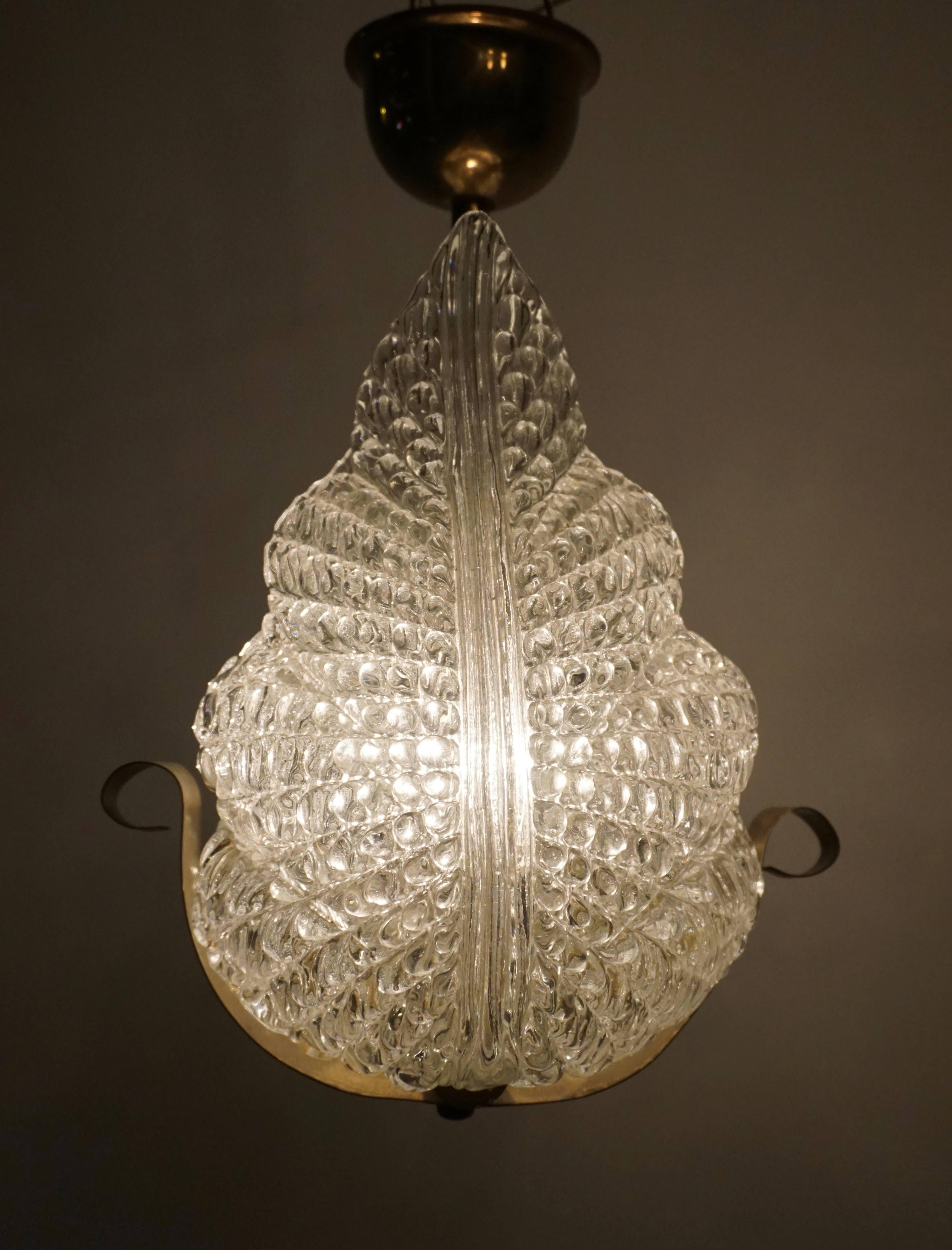 One Italian Brass and Murano Glass Pendant Light. 12