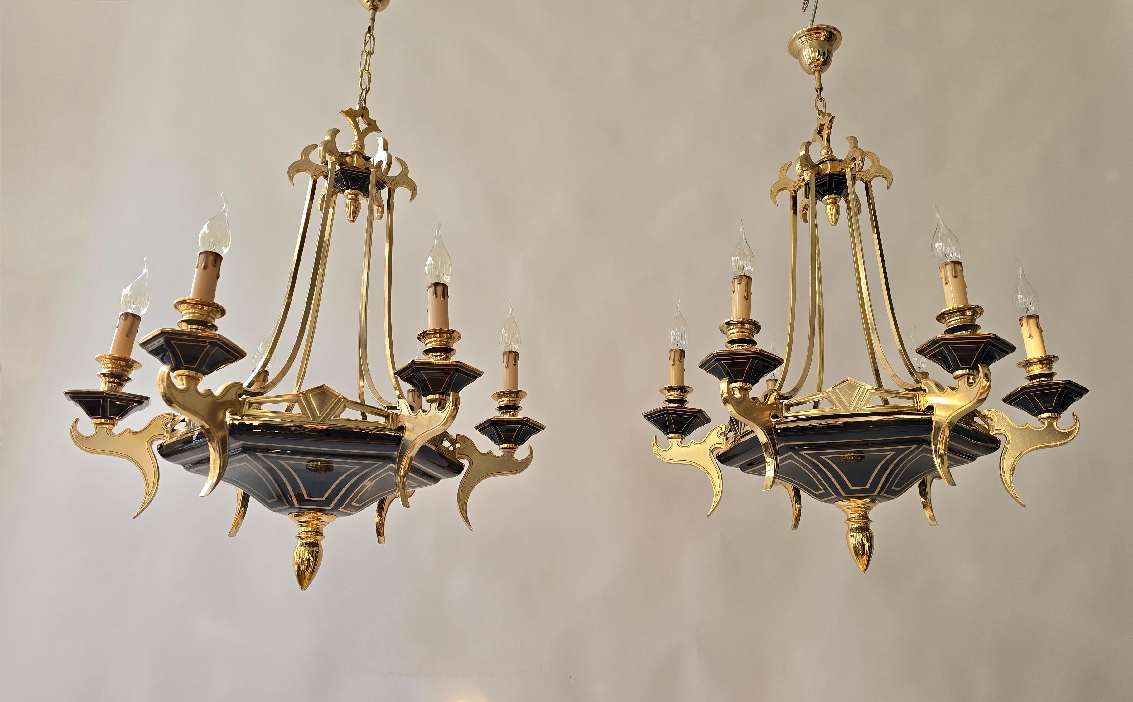 Italian Brass and Porcelain Chandelier, circa 1970-1980

A remarkably rare and refined Italian chandelier, made in Italy between 1970 and 1980. This impressive fixture is made of polished solid brass combined with high-quality black porcelain,
