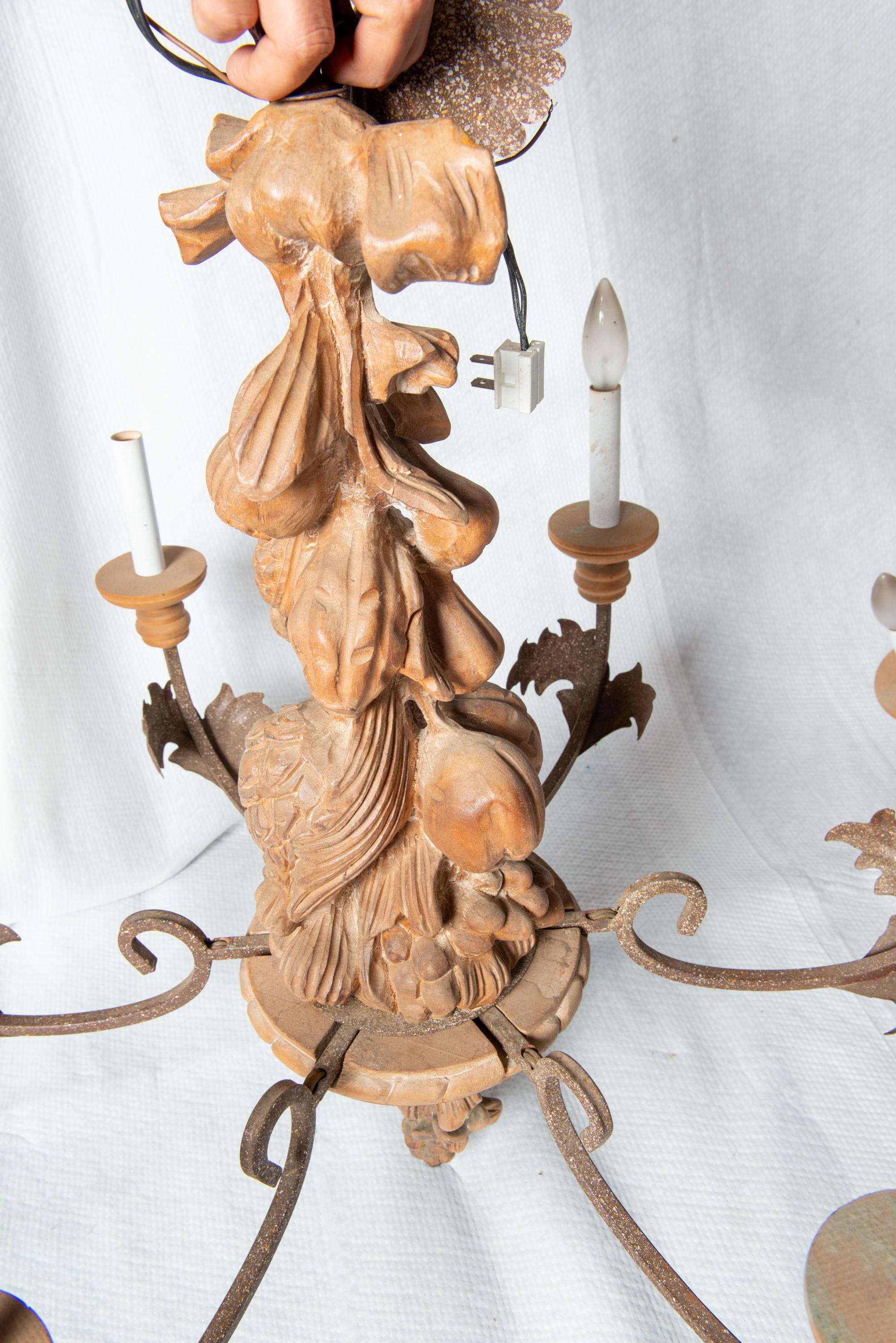 Two Italian Carved Wood and Wrought Iron Chandeliers For Sale 9