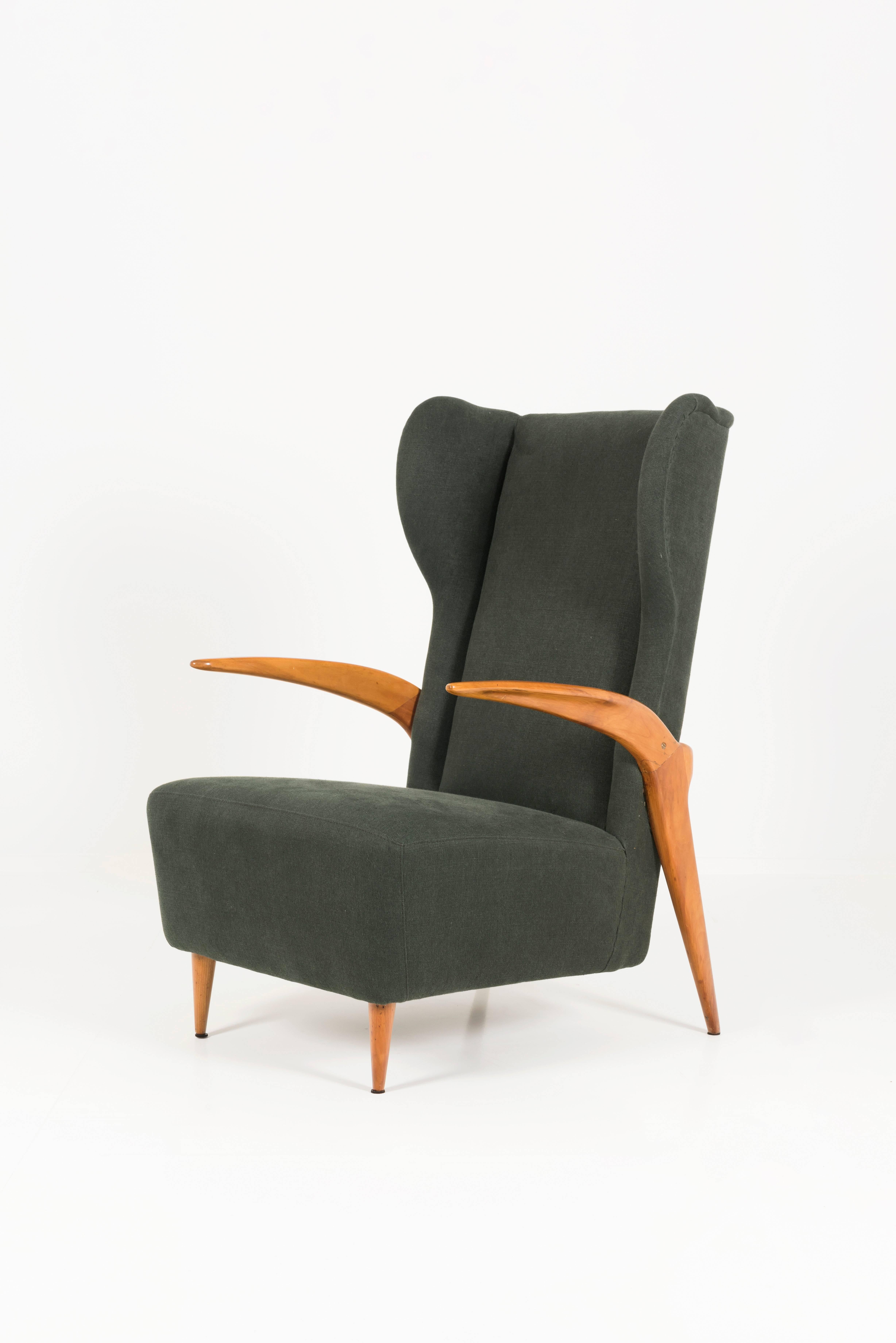 Two vintage armchairs with high back and dark green upholstery fabric, the structure is in polished cherrywood, attributed to Enrico Ciuti Italy, circa 1955
Measure: Height 69 x 70 cm deep.