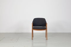 Two Italian Walnut Armchairs, Model 814, Ico & Luisi Parisi for Cassina, 1960s.