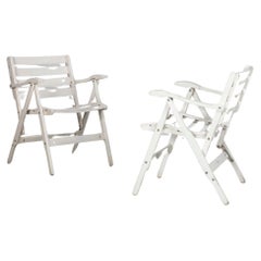 Two Italian white folding garden chairs, by Fratelli Reguitti from the 1950s