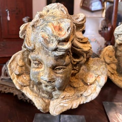 Two Italians 1920s Baroque style Stone Head of Angels on Iron Pedestals