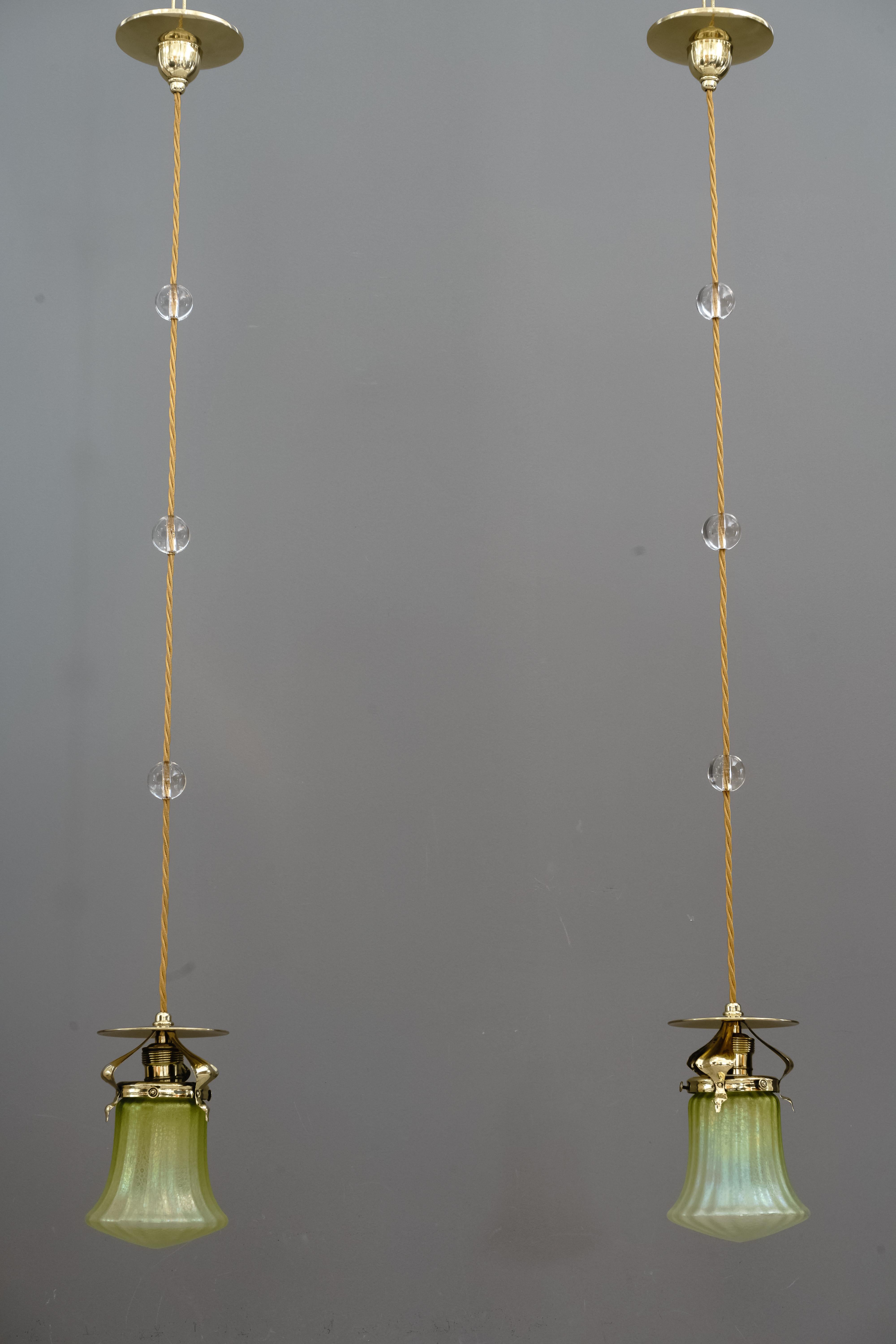 Two Jugendstil pendants, Vienna, circa 1908
Brass polished and stove enamlled
Beautiful original lötz glasses.
