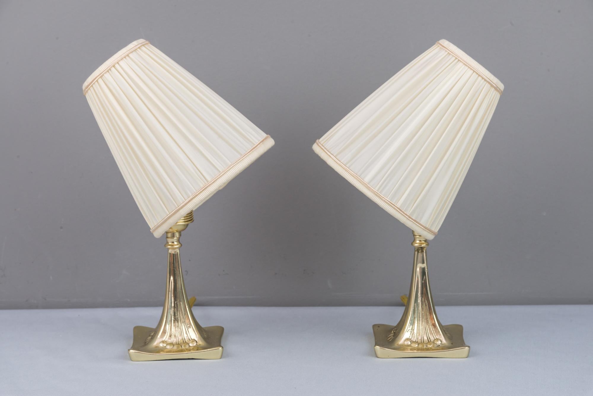 Two jugendstil table lamps, circa 1908
Brass polished and stove enamelled
The fabric is replaced (New)
The price is for both.