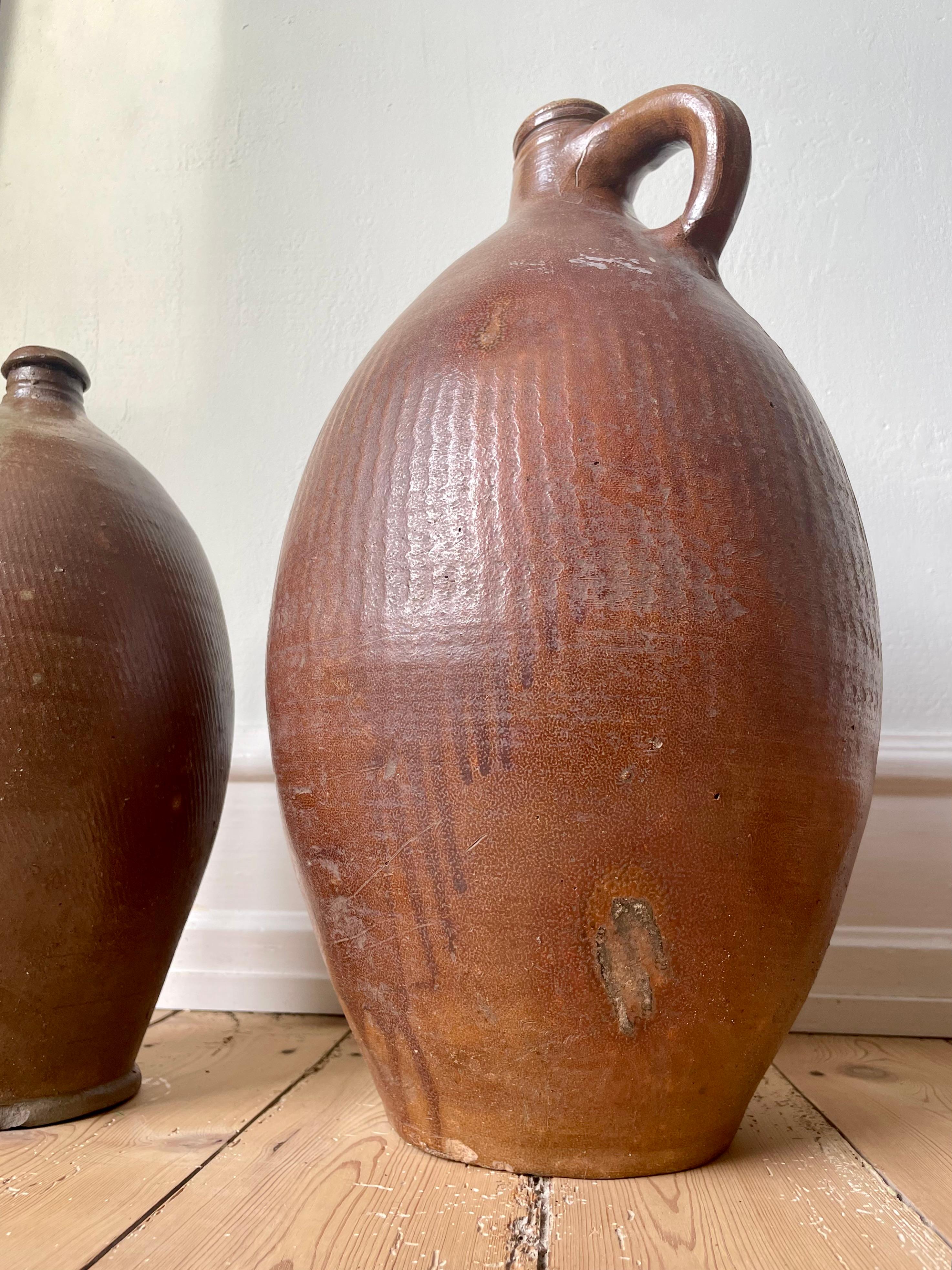 French Provincial Two Large 19th Century French Terracotta Cruche Bottle Jugs For Sale
