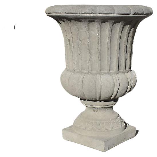 A set of two very large classical concrete planters. This set will be fabulous flanking a front door, on a patio, or in a garden. We also love the idea of using them for champagne and ice at your next party. 

Dimensions:
24.75