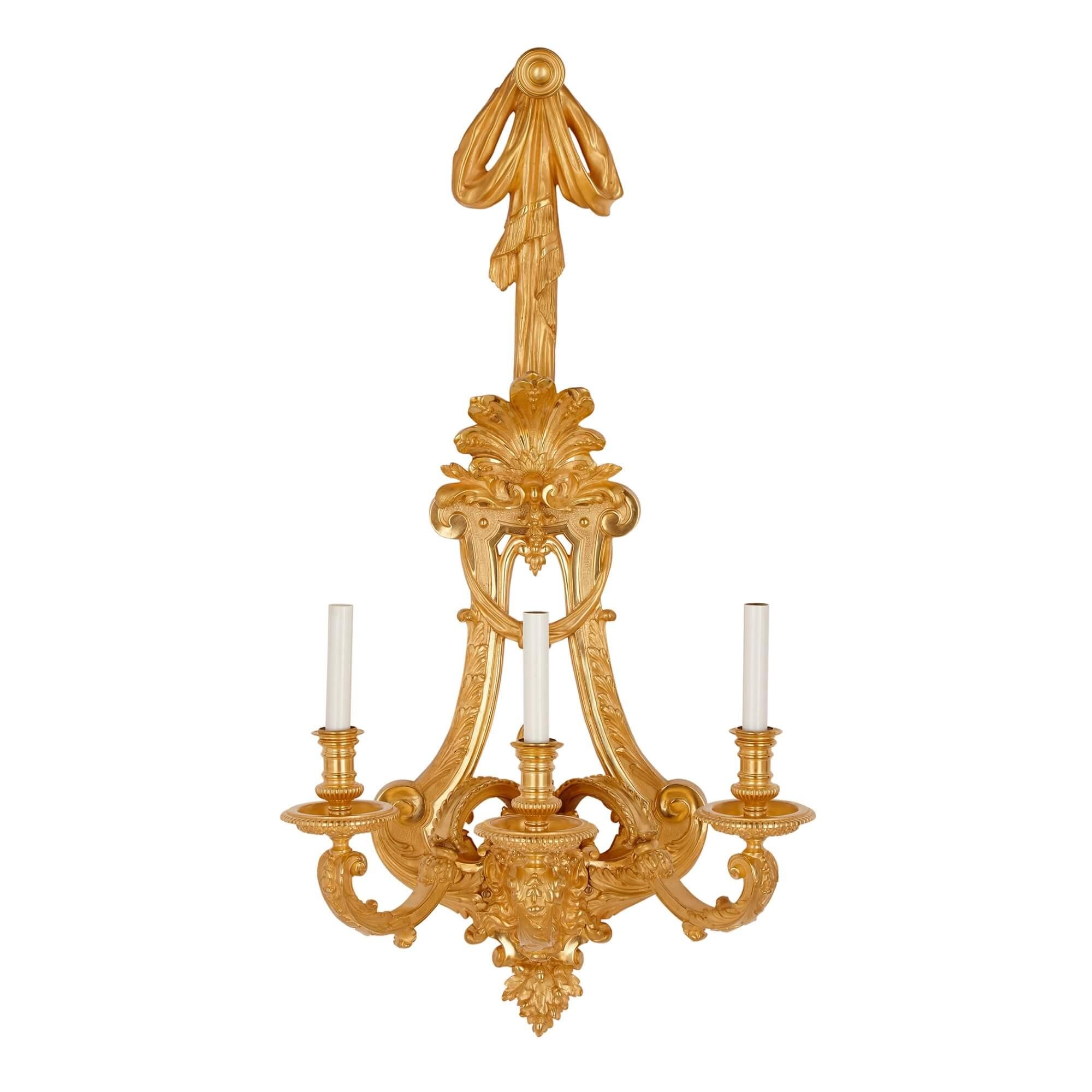 Two large French ormolu three-branch wall sconces by H. Vian
French, late 19th Century
Height 95cm, width 48cm, depth 30cm

These large three branch lights, measuring a colossal 95cm in height, were made by the important late 19th Century bronzier
