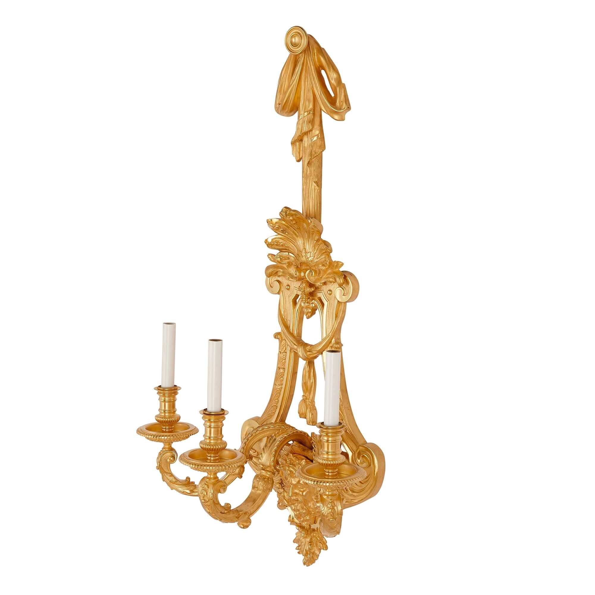 Baroque Two large French ormolu three-branch wall sconces by H. Vian For Sale