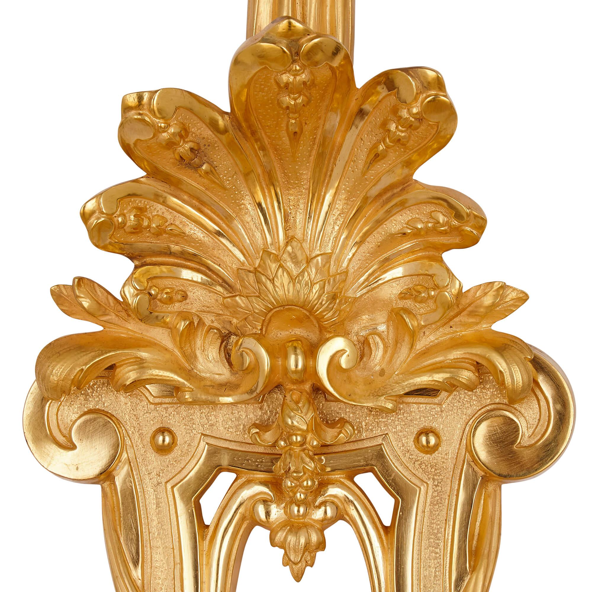 Gilt Two large French ormolu three-branch wall sconces by H. Vian For Sale