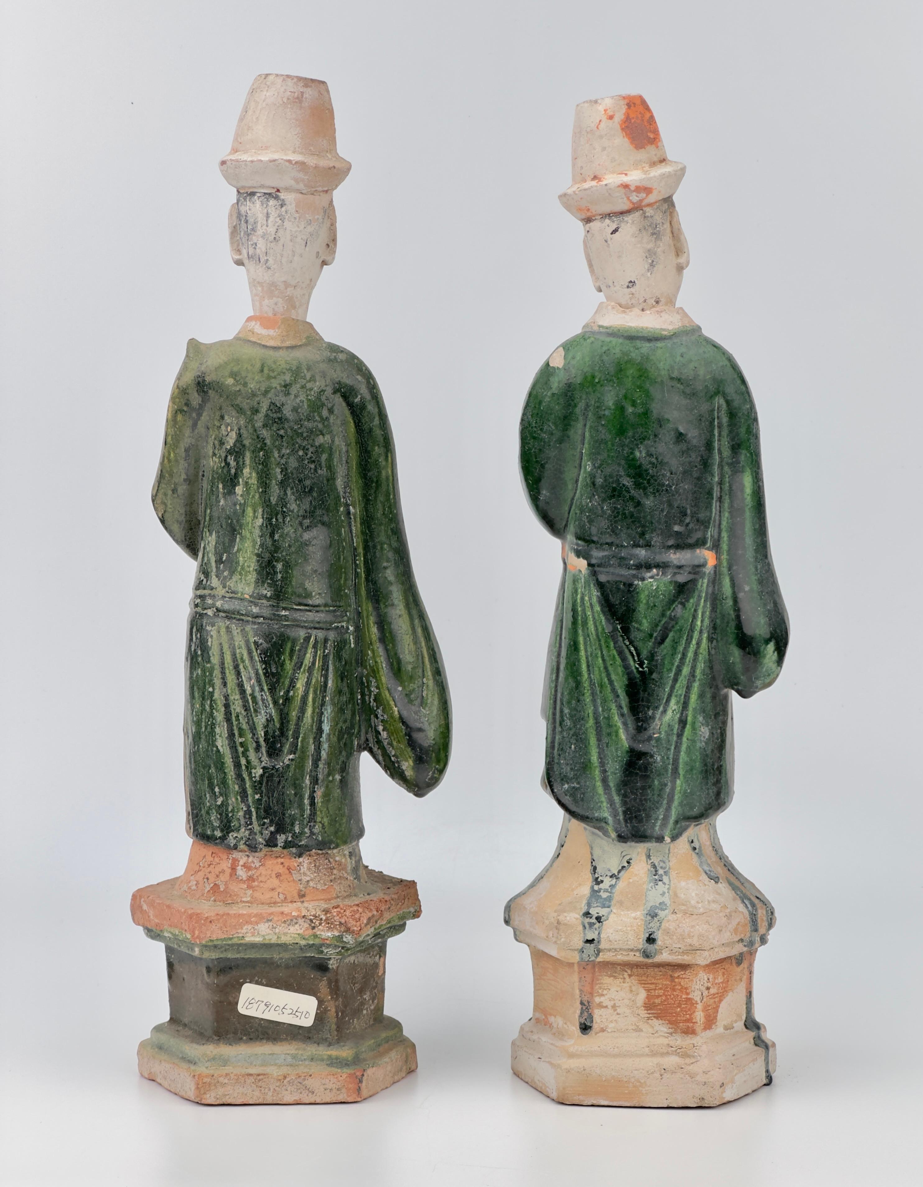 Hong Kong Two Large green glazed figures, Ming Period (1368-1644)