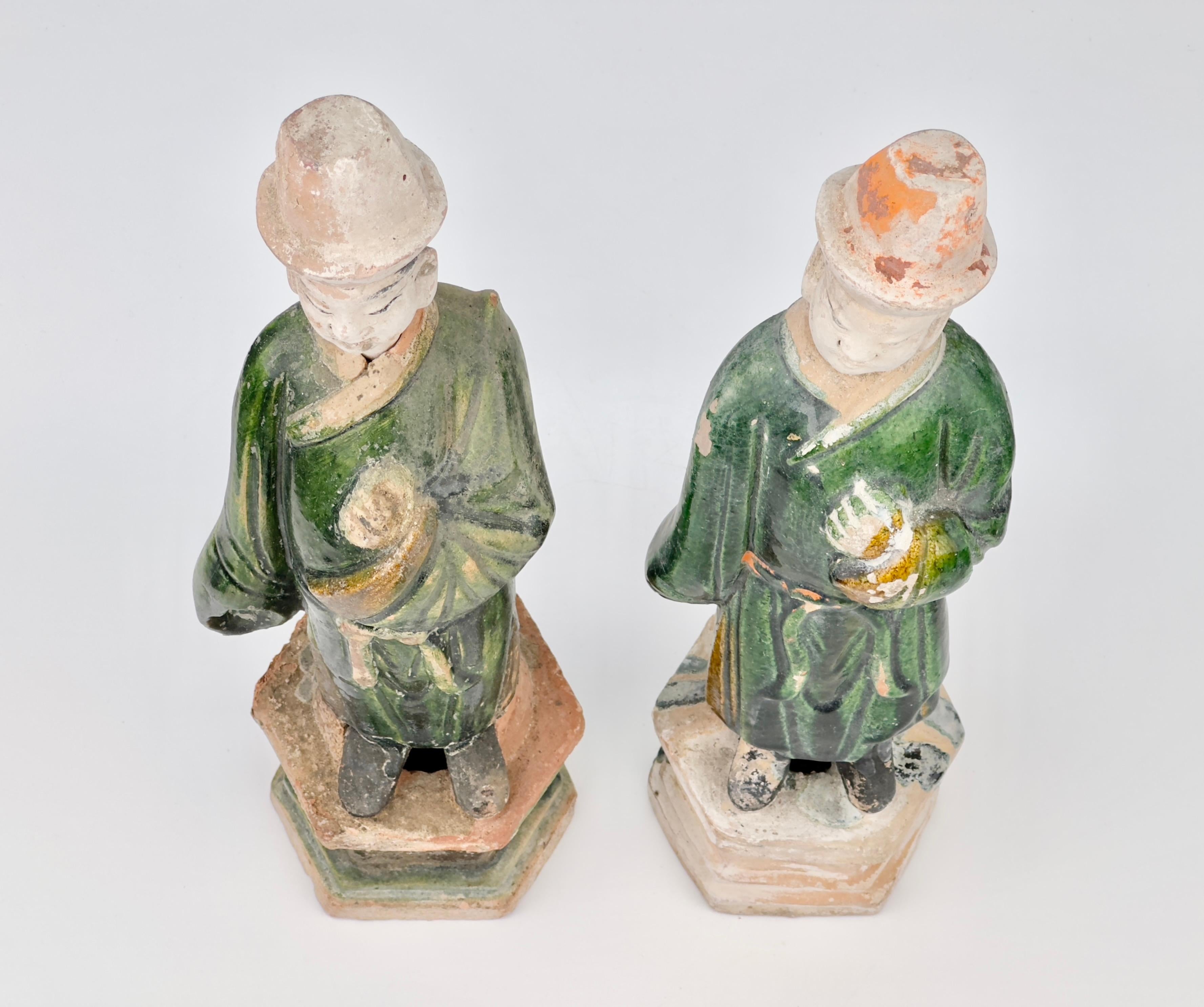 18th Century and Earlier Two Large green glazed figures, Ming Period (1368-1644)