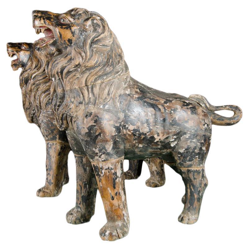 Two Large Life Sized Polychromed Lion Head Wooden Statues For Sale