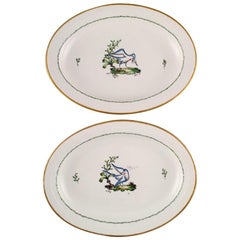 Dos grandes fuentes ovaladas Royal Copenhagen de porcelana pintada a mano