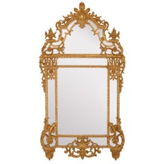 Two large Régence style carved giltwood wall mirrors
