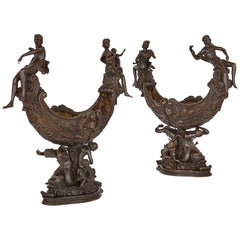 Two large Renaissance style bronzed metal centrepiece garniture