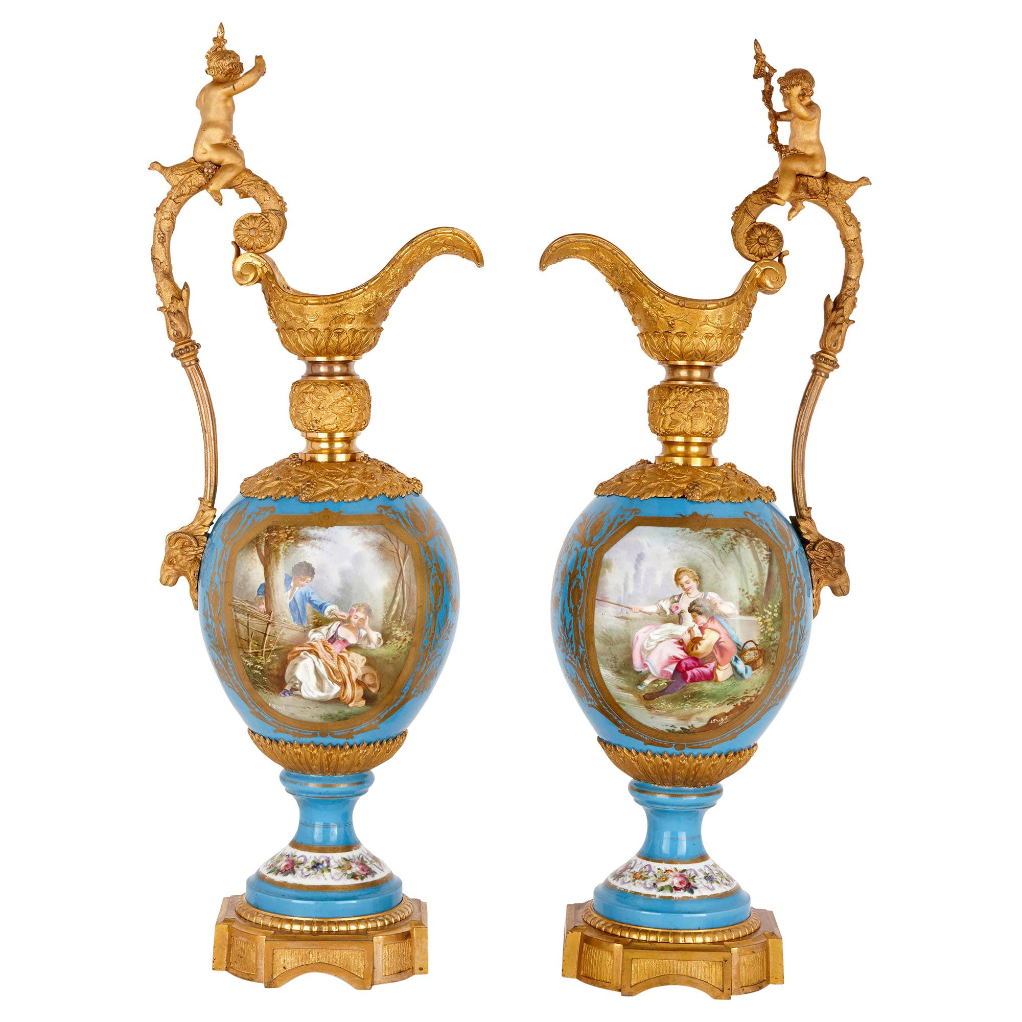 Two Large Rococo Style Porcelain and Gilt Bronze Jugs
