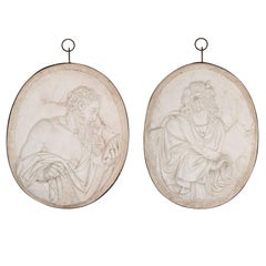 Two Large Sculpted Marble Relief Plaques of St John and St James