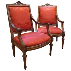 Two Late 18th Century Italian Louis XVI Armchairs in Carved Walnut Wood