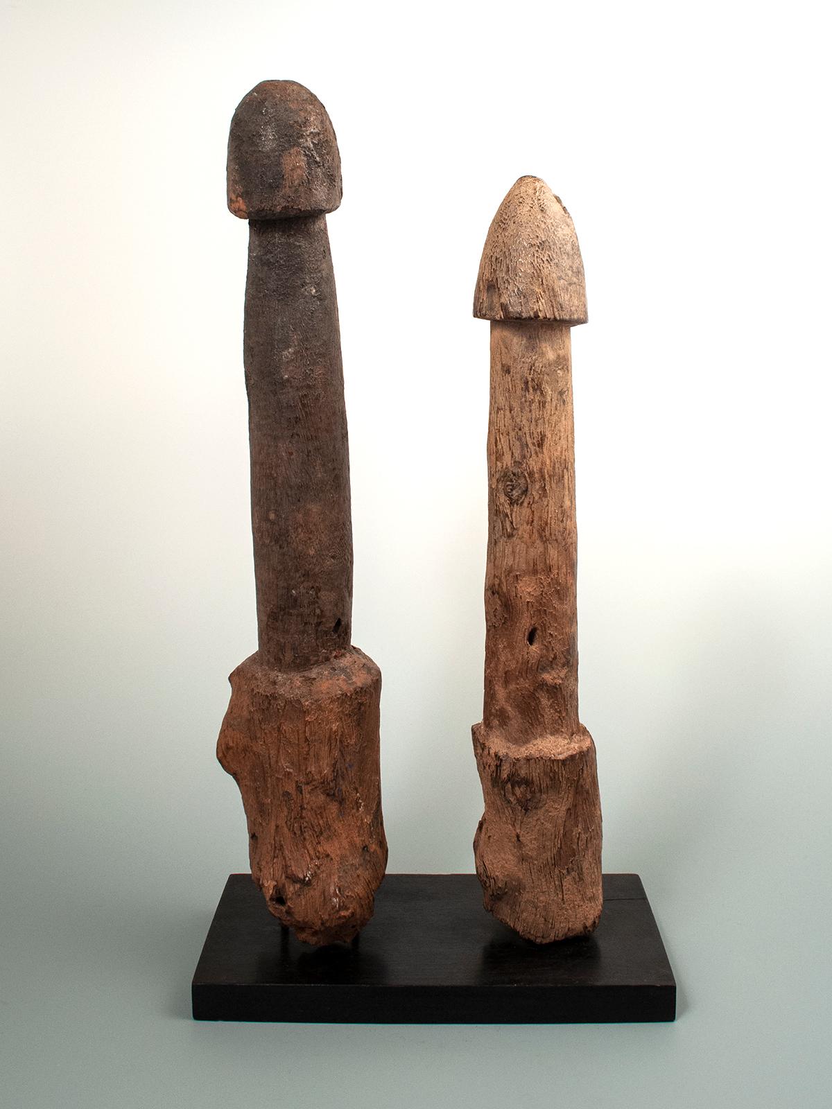 Two late 19th-early 20th century wood Legba phalluses, Fon people, West Africa

Two large carved hardwood phalluses from the Fon Tribe on the border of Togo and Ghana. These are called Legba, named after a deity, and were placed in the ground to