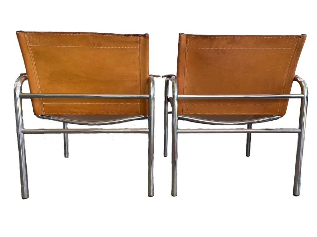 Two Leather and Tubular Steel Arm Chairs 'Klinte' by Tord Björklund, Mid-Century In Good Condition In Wichita, KS