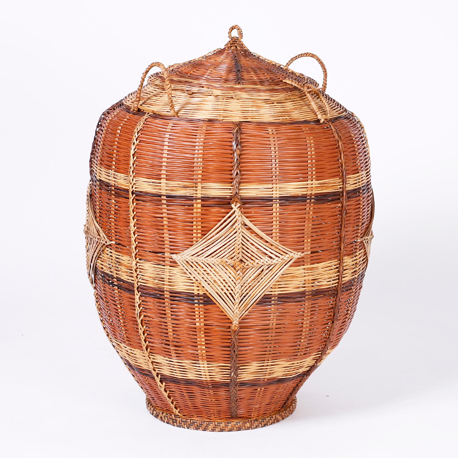 Two Lidded Woven Reed Baskets 1