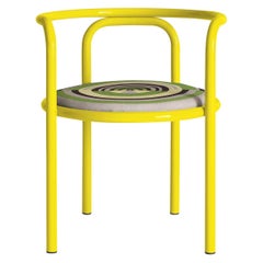 Two Locus Solus Yellow Chairs and One Locus Solus Yellow Dining Table 