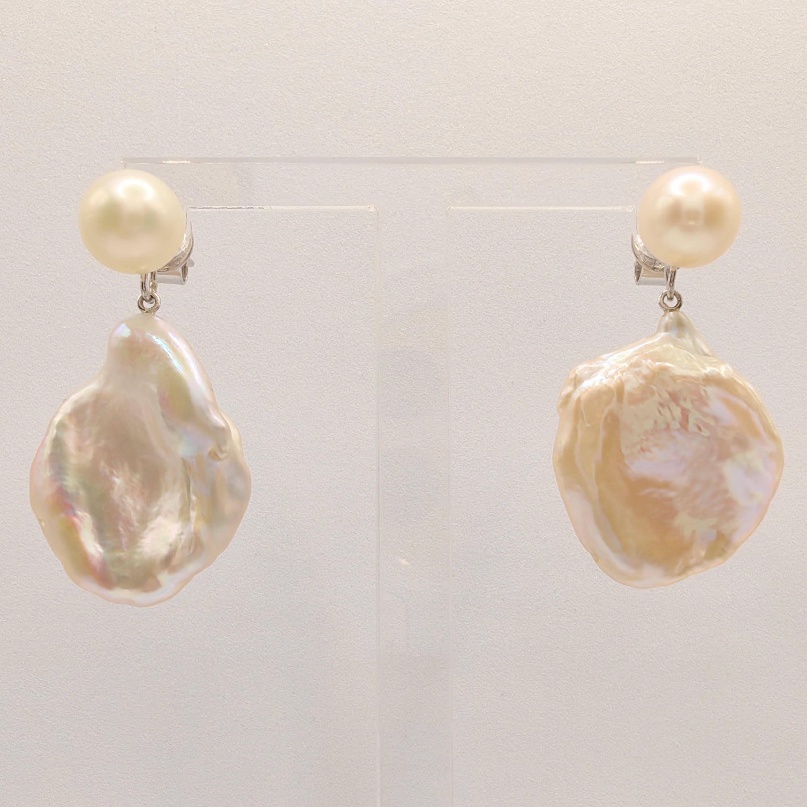 Introducing our versatile Two-Look White Pink Peach Pearl Stud & Keshi Pearl 18K White Gold Drop Earrings, a captivating accessory that offers two distinct and stylish looks in one exquisite piece.

The earrings feature a pair of 8mm Freshwater