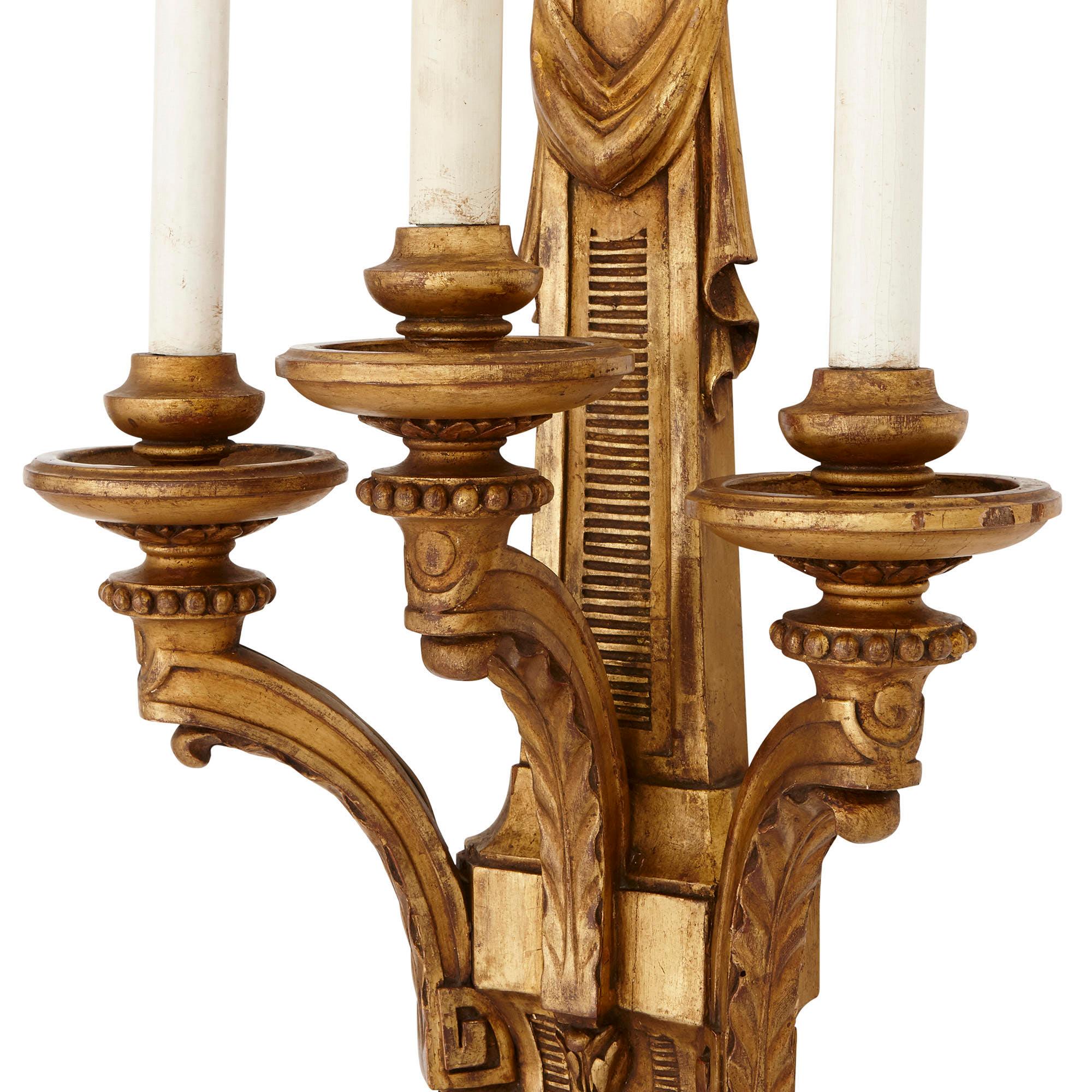 French Two Louis XVI Style Carved Giltwood Wall Sconces For Sale