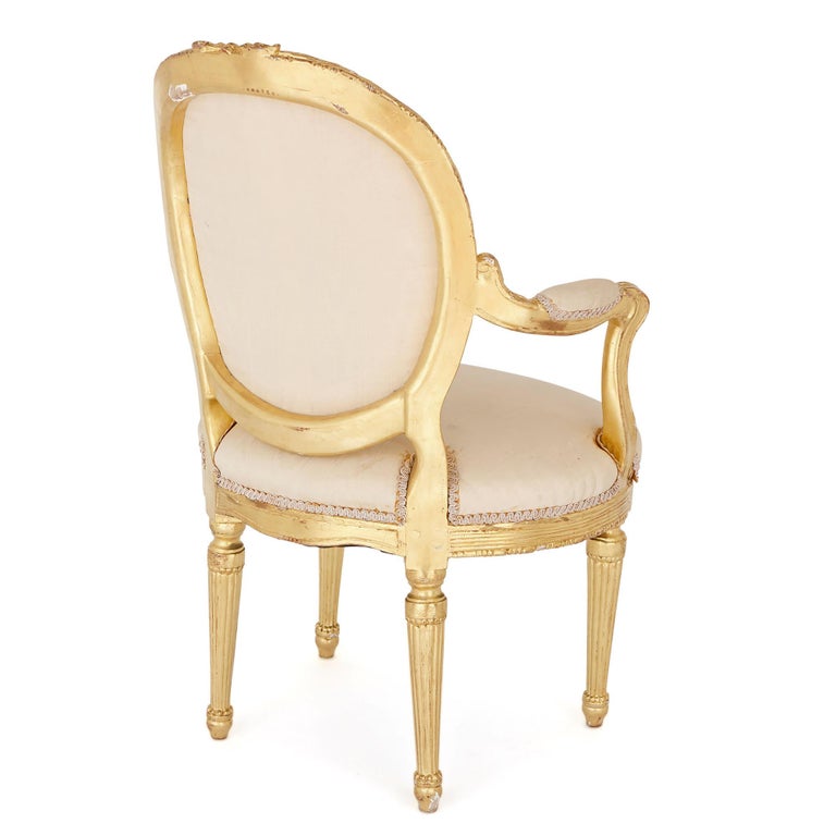 French Two Louis XVI Style Giltwood Upholstered Fauteuil Armchairs For Sale