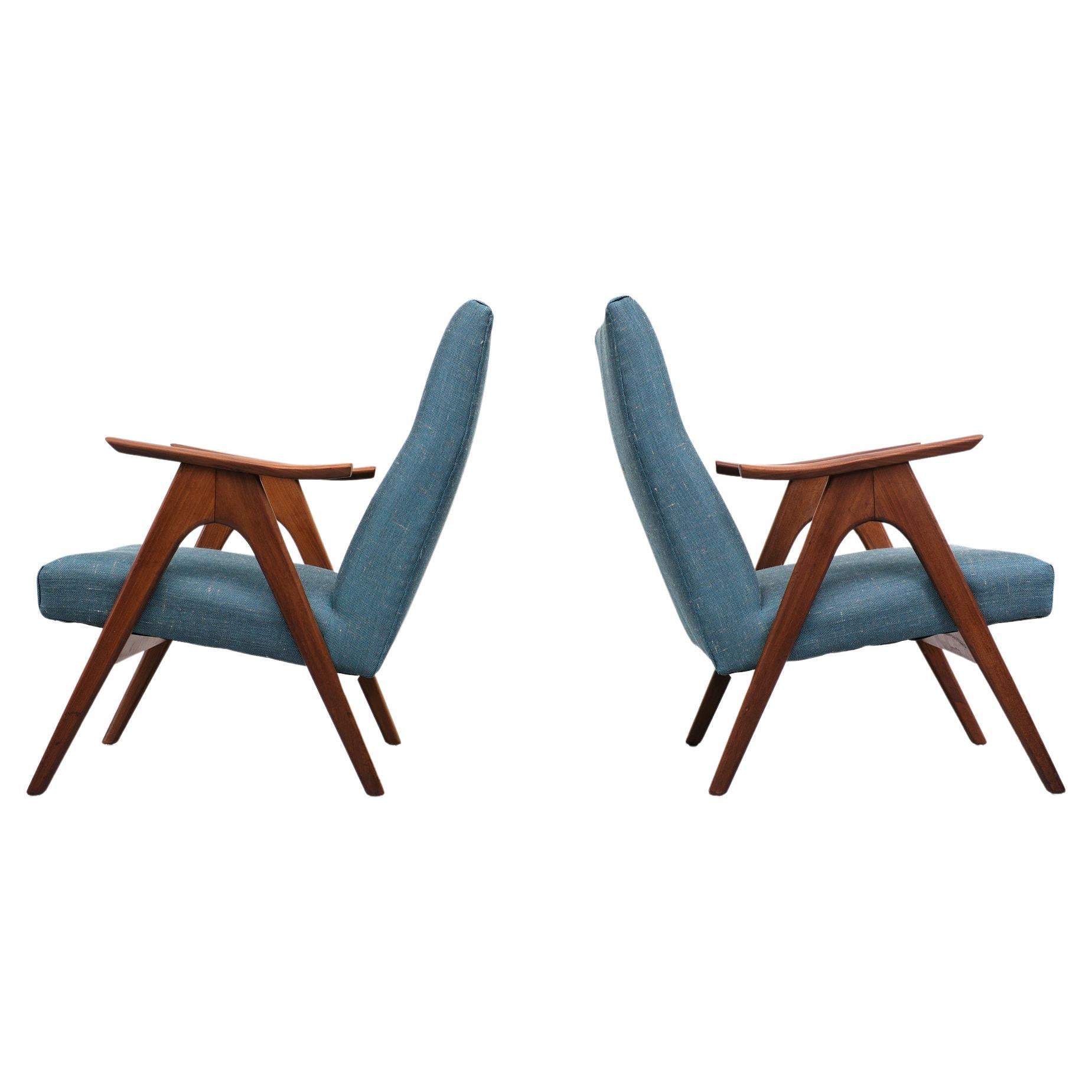 Two Beautiful easy chairs. Solid Teak frame, comes with a brand new upholstery. 
in a mixed Blue color. Very good quality fabric, Design Louis van Teeffelen for Wëbë 
Holland 1960s Very nice organic curved Armrests. Good seating comfort.