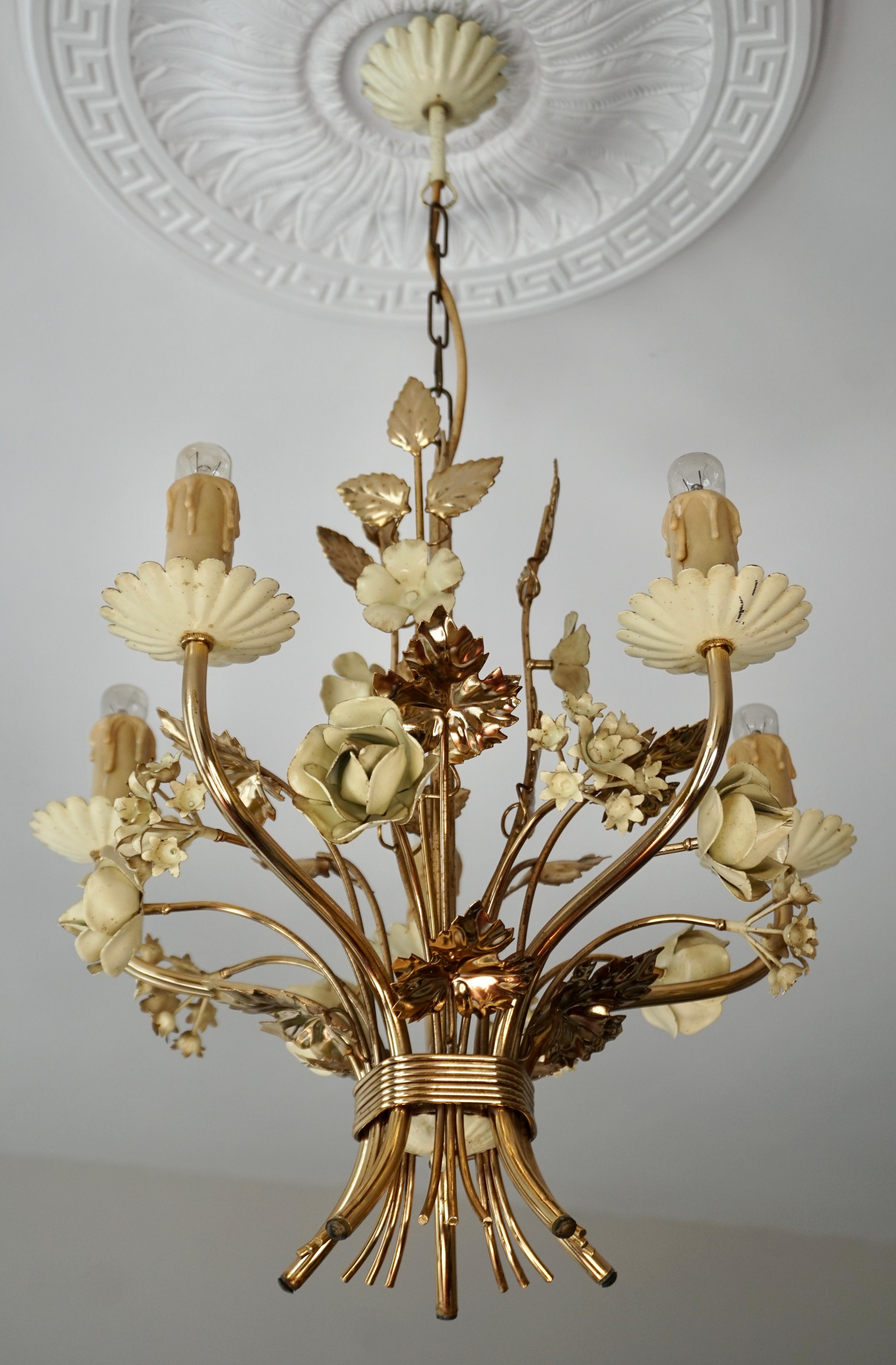Two beautiful, fine and delicate gilt brass leaves chandelier with white flowers. 
France, circa 1950s. 
Socket: 5 x e14 (Edison) for standard screw bulbs.

Total height 72 cm.
Please note that price is per item not for the set.