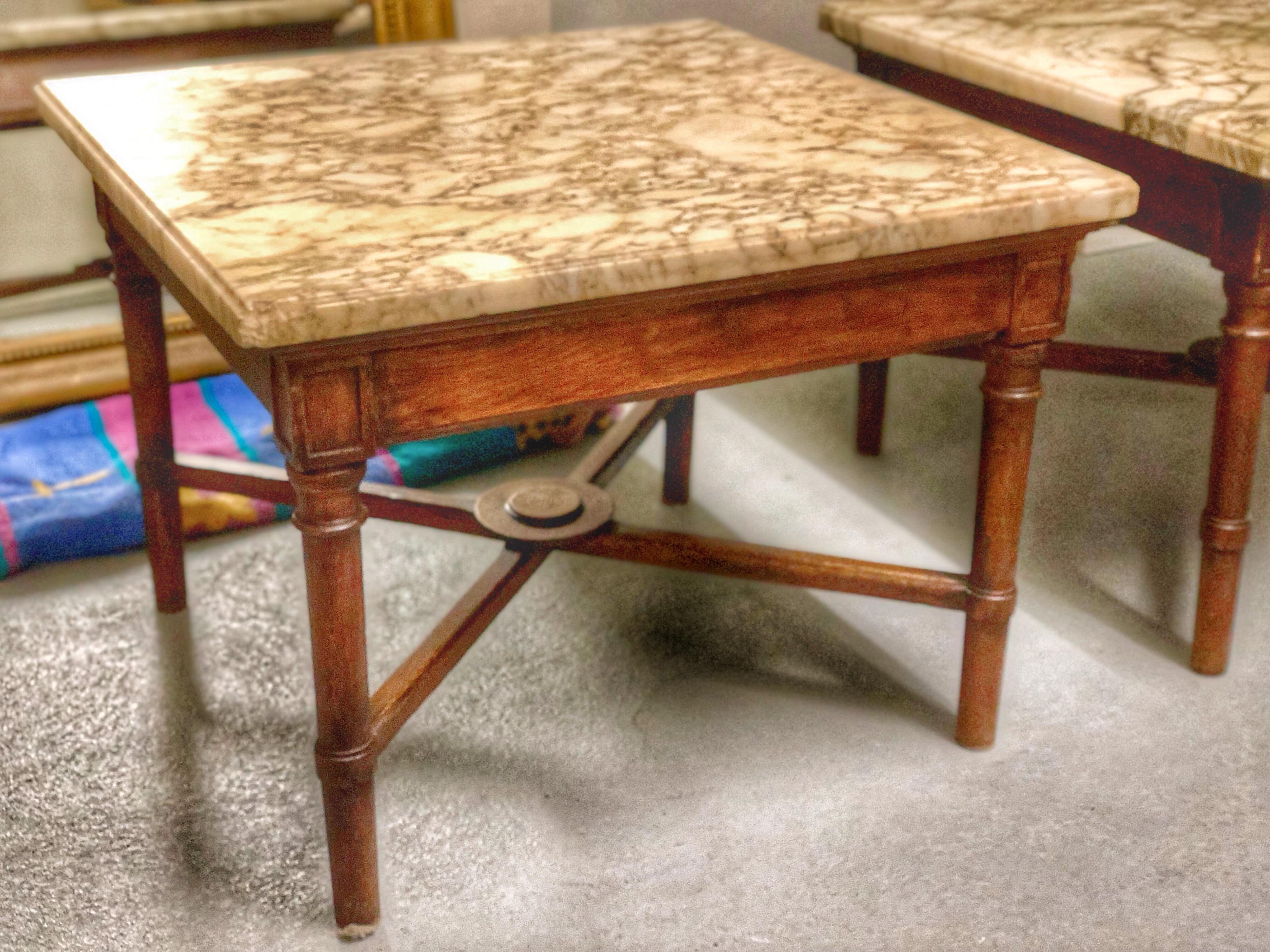 Beautiful two low square wood base marble tables, France, circa 1960 in good condition with a very light (not visible) crack.