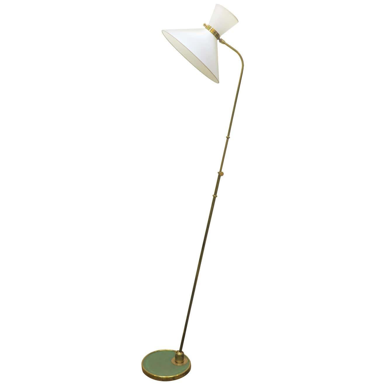 Two Lunel lamps offered together. This is a customized listing specific for order purposes only.
Lamp A French midcentury articulating brass floor lamp diablo by Maison Lunel. Fully adjustable rotation in 360 degrees with height adjustment from 64