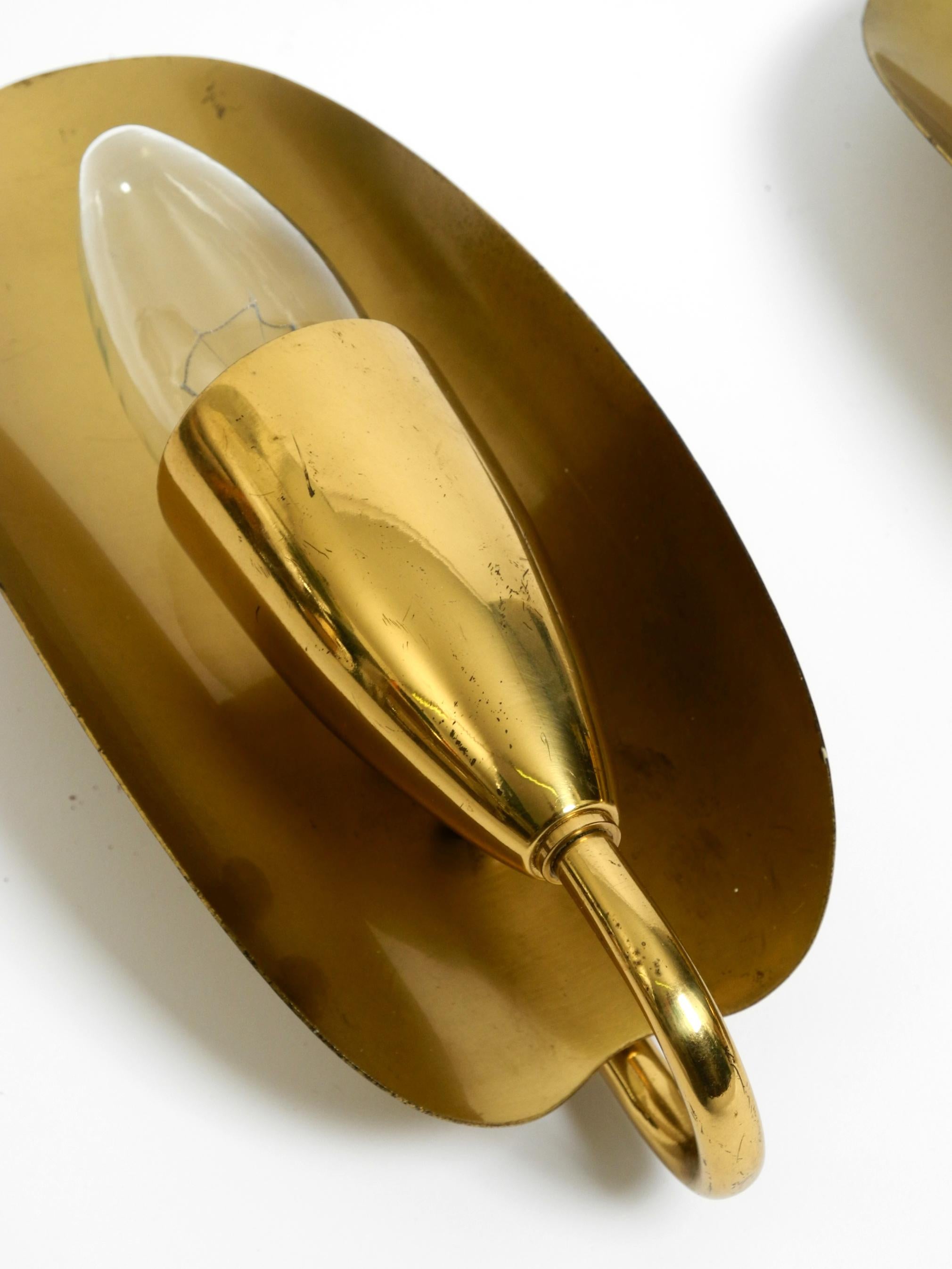Brass Two magical original Mid Century Modern bag brass wall lamps