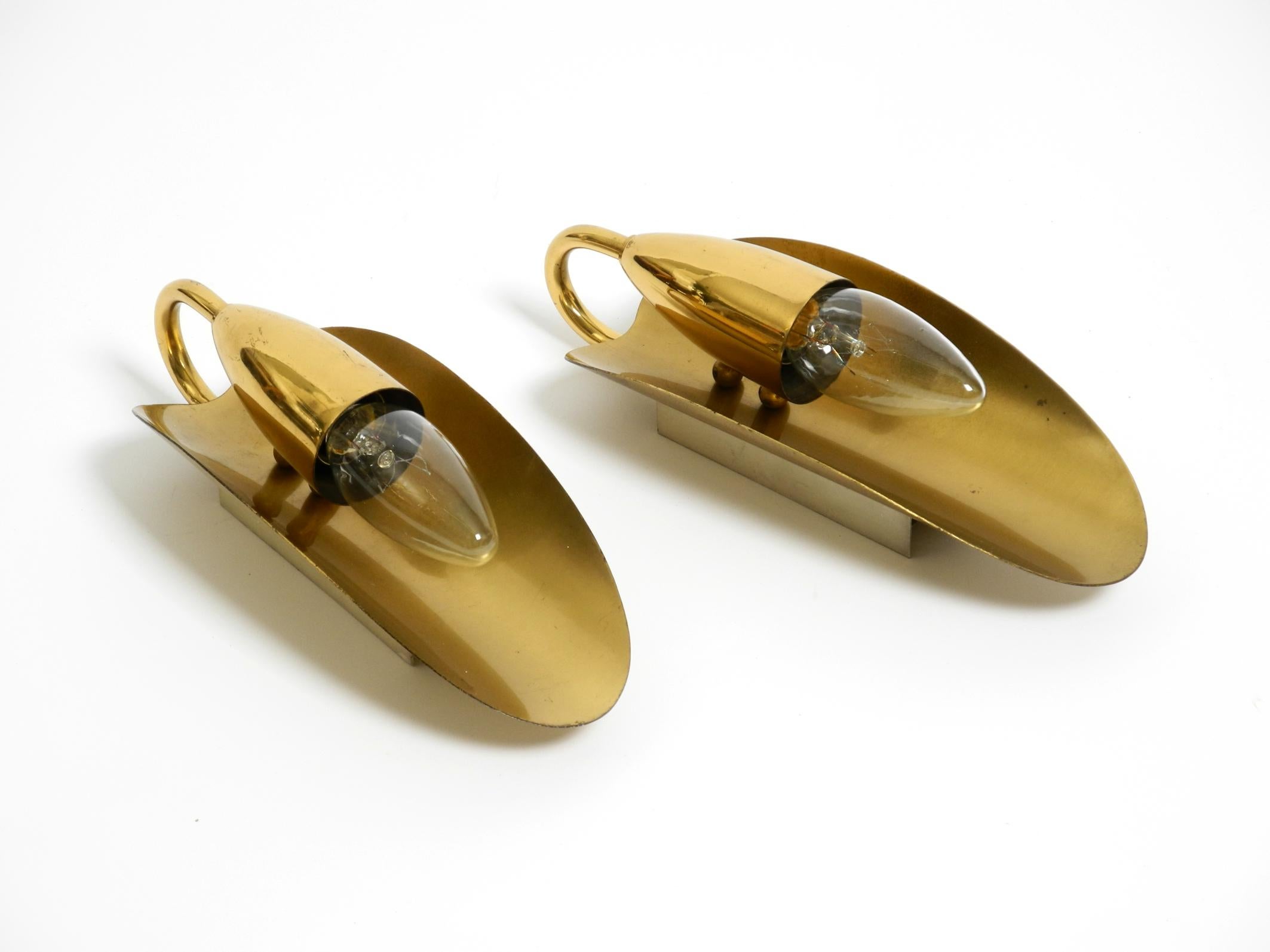 Two magical original Mid Century Modern bag brass wall lamps 1
