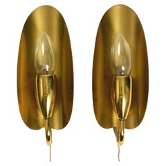 Two magical original Mid Century Modern bag brass wall lamps