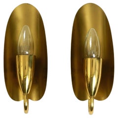 Two magical original Mid Century Modern bag brass wall lamps