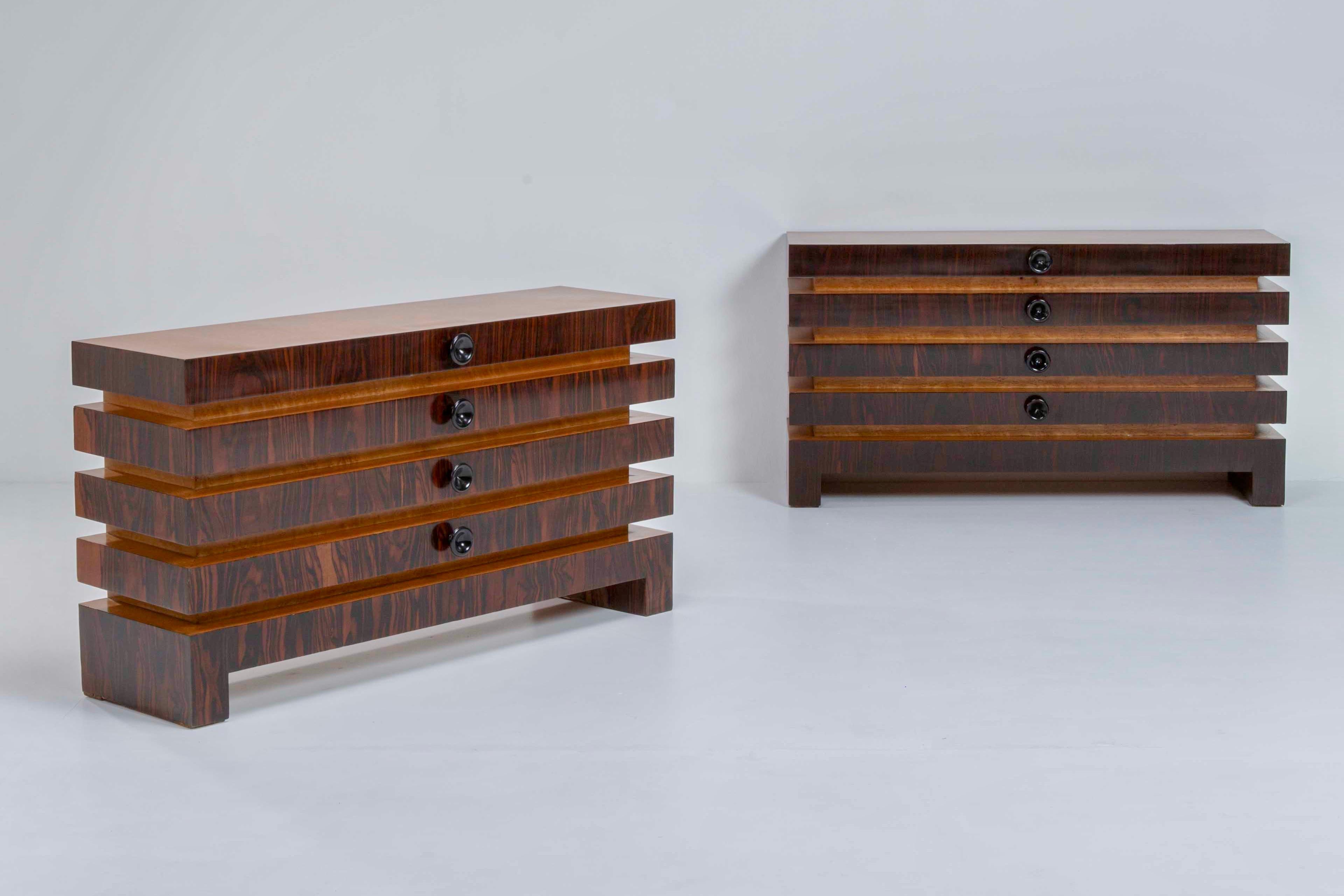 These two wood consoles are stunning interiors of Mid-Century Italian Design. Boasting sleek linear shapes, the consolles embody elegance and sophistication. Crafted with precision, they captures the essence of minimalist luxury. These consolles are