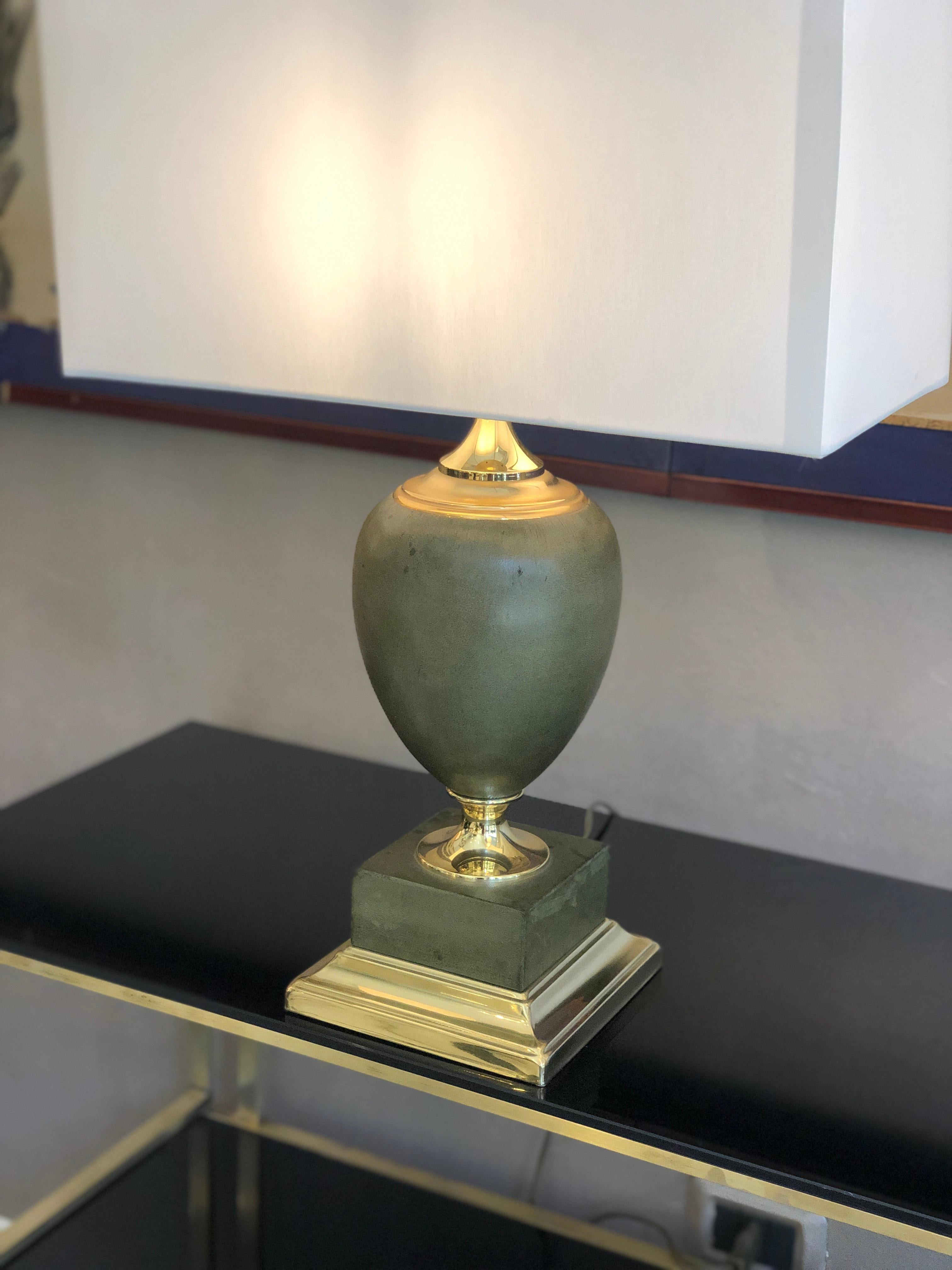 Hollywood Regency Two Maison Le Dauphin a Pair of Regency Leather and Brass Table Lamps