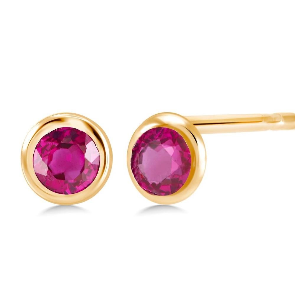 Two Matched Burma Rubies Weighing 1.10 Carat Bezel Set Yellow Gold Stud Earrings In New Condition In New York, NY