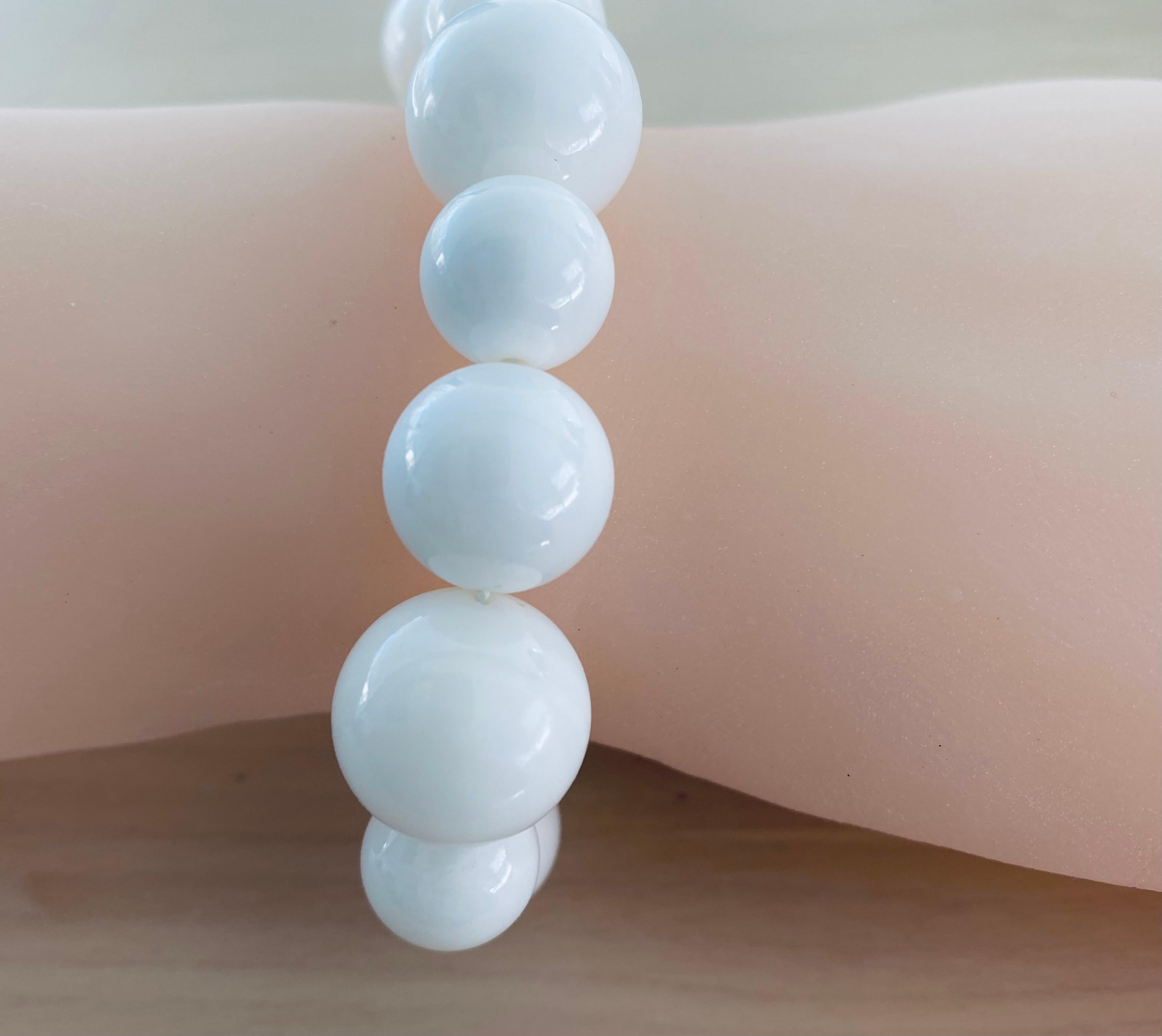 white beaded bracelet meaning
