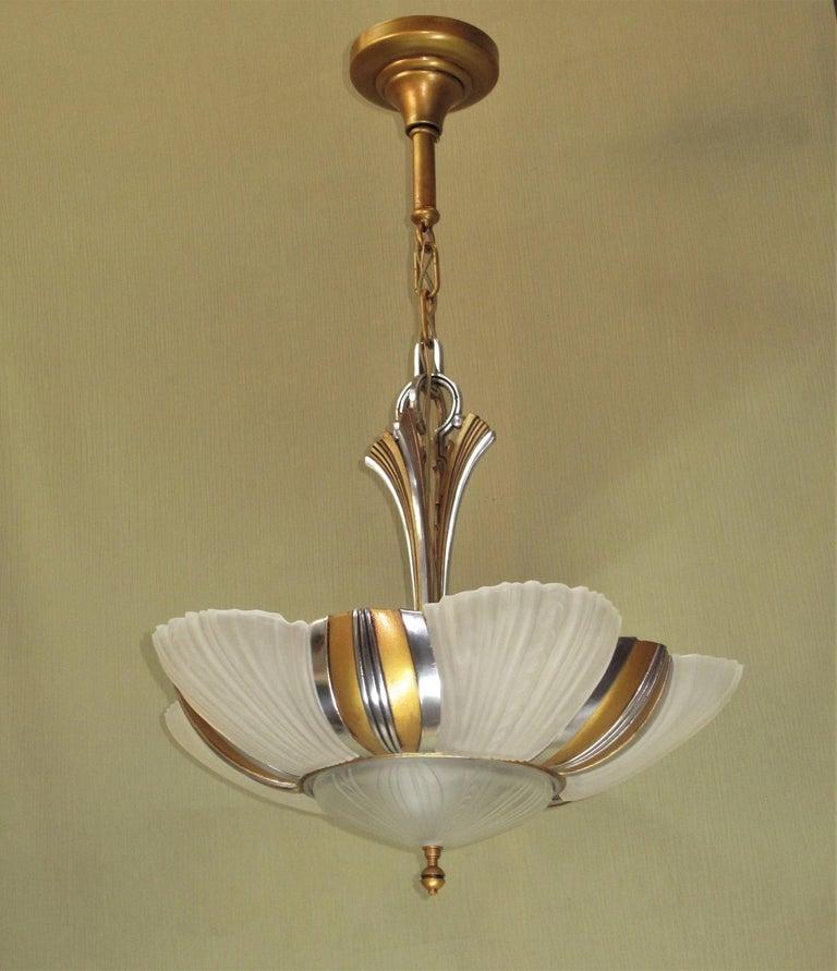 Two matching 7 light bulb 1930s Art Deco ceiling fixtures, priced each. Restored In Good Condition For Sale In Prescott, US
