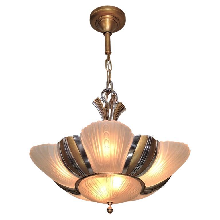 Two matching 7 light bulb 1930s Art Deco ceiling fixtures, priced each. Restored For Sale