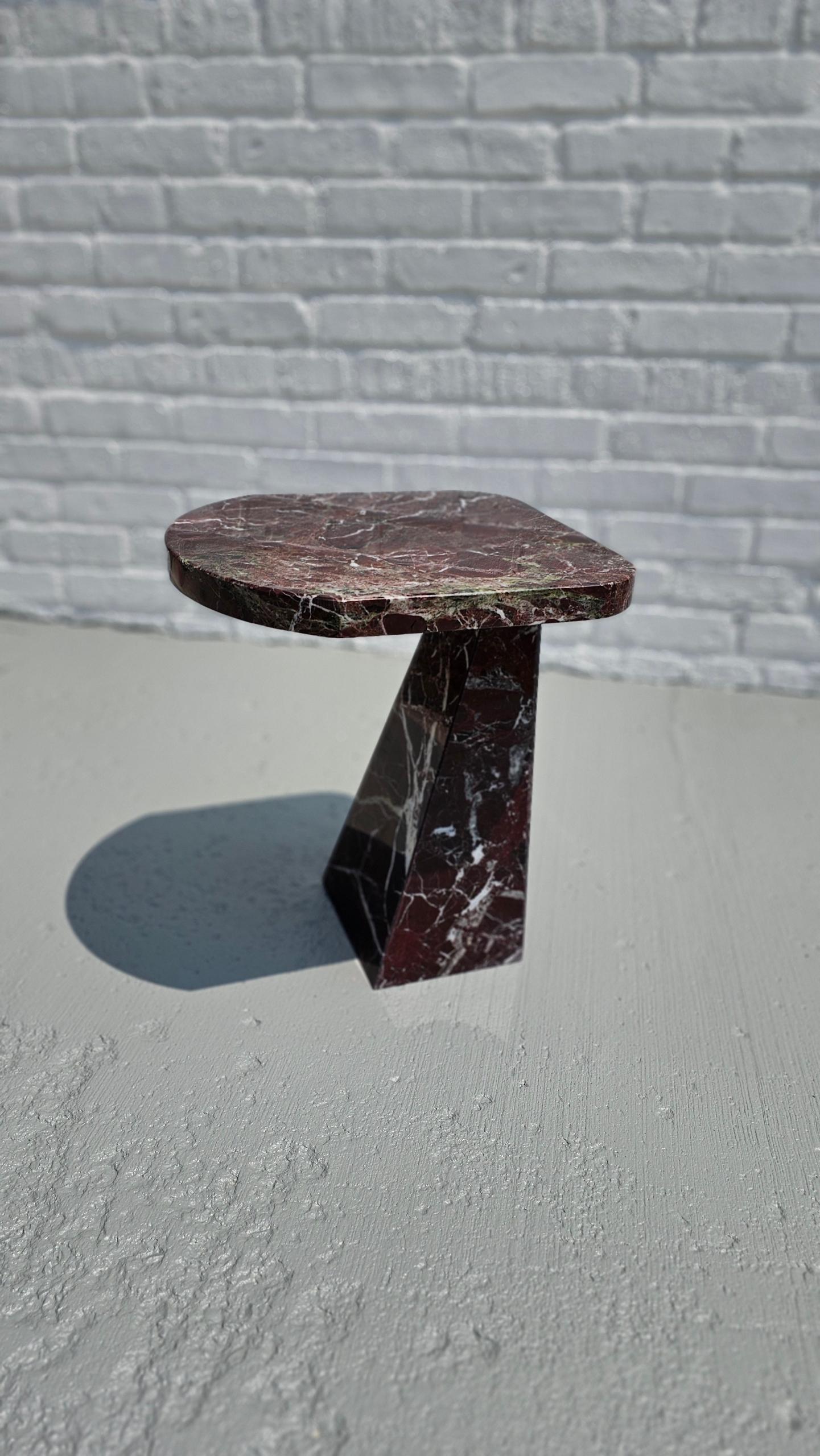 Together or apart, these two Rosso Levanto marble end tables could be the perfect accessory to almost any room.  With their angled bases and small elliptical tops, they have a whimsical modern flair.  They would go well in a Great Room, Study,