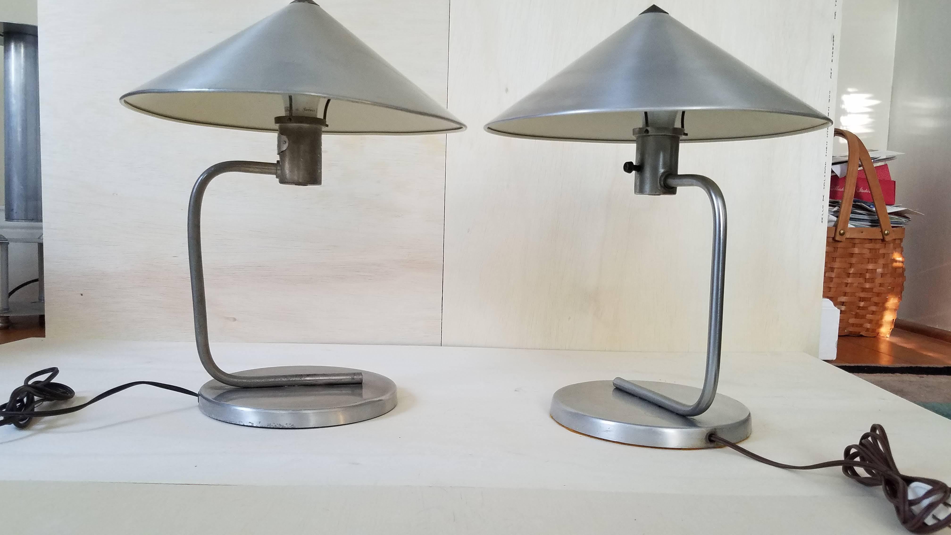 One of the very recognizable American lamps of the pre WW II Art Deco period.
Walter Von Nessen was a trained German industrial designer who arrived in New York at the dawn of the American Art Deco movement in 1927 founding Nessen Studios.
His