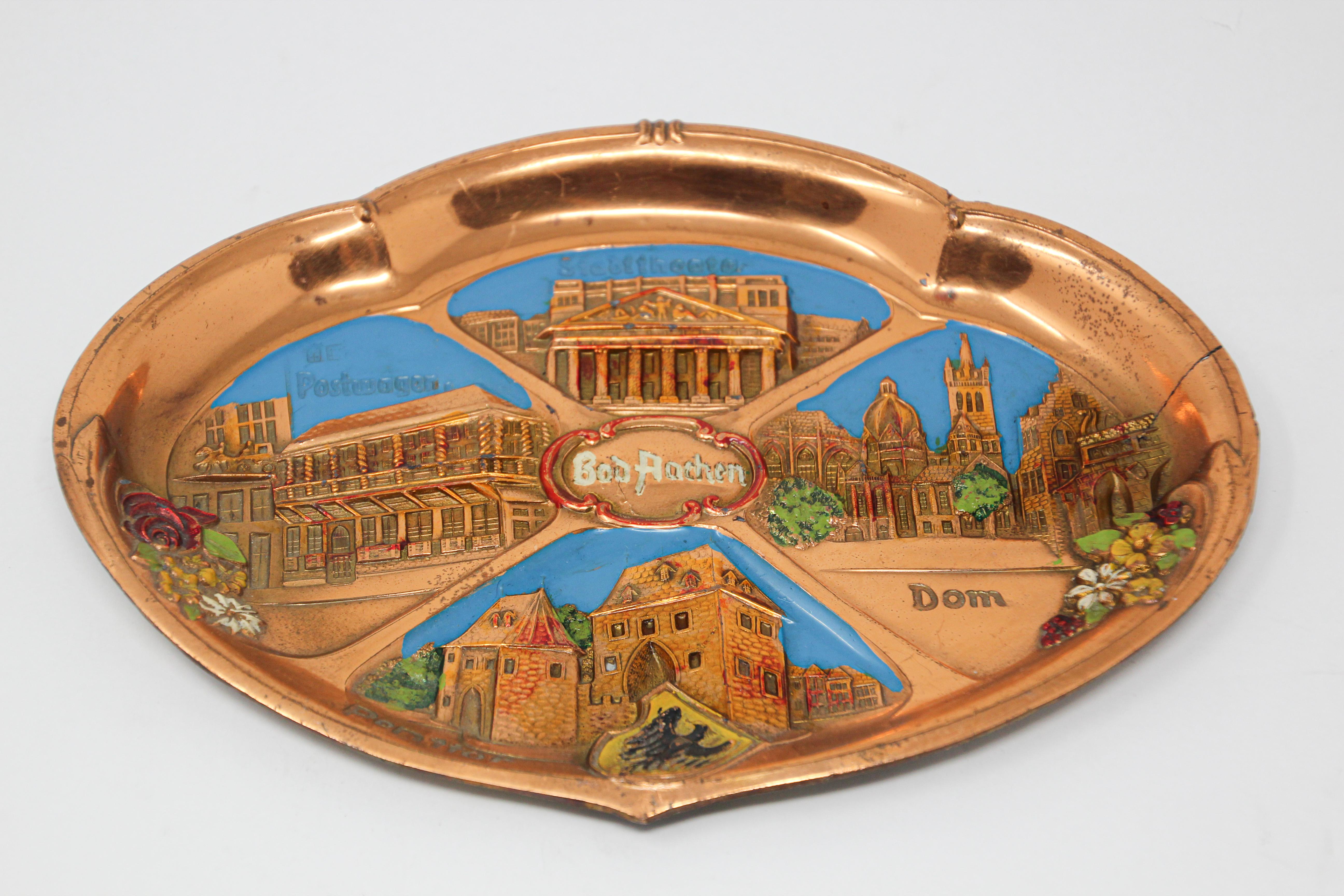 Two metal copper plates Souvenir of Germany.
One of Cologne, Koln.
Cologne is a major cultural centre for the Rhineland; it hosts more than 30 museums and hundreds of galleries. Exhibitions range from local ancient Roman archeological sites to