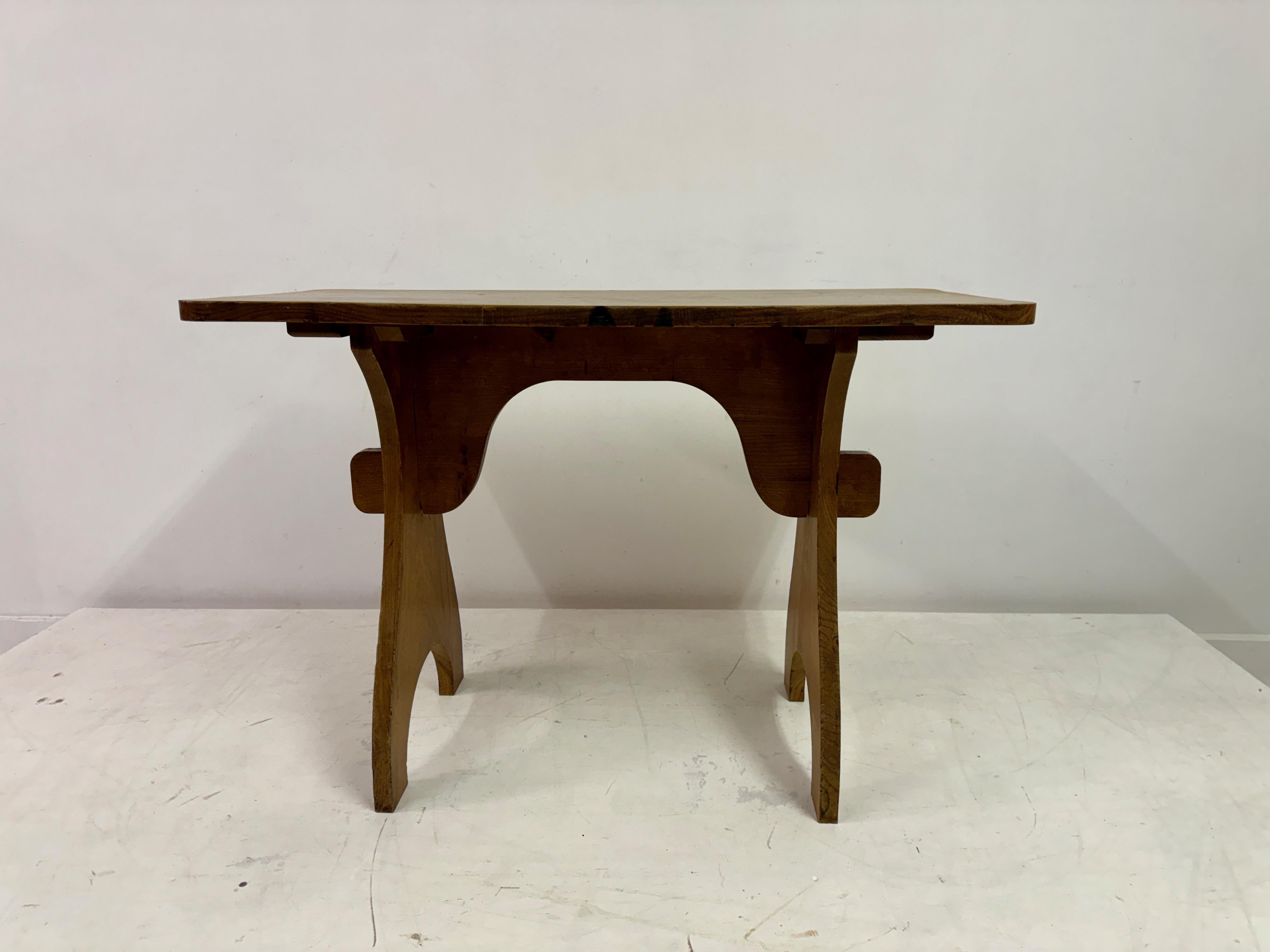 Table or desk

Elm

Arts and craft style

Probably originally used as desks in a school

Tables show marks, wear and burns

Photos show both tables

England 1950s